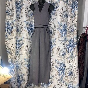 Black and White Striped Sleeveless Jumpsuit with Pockets